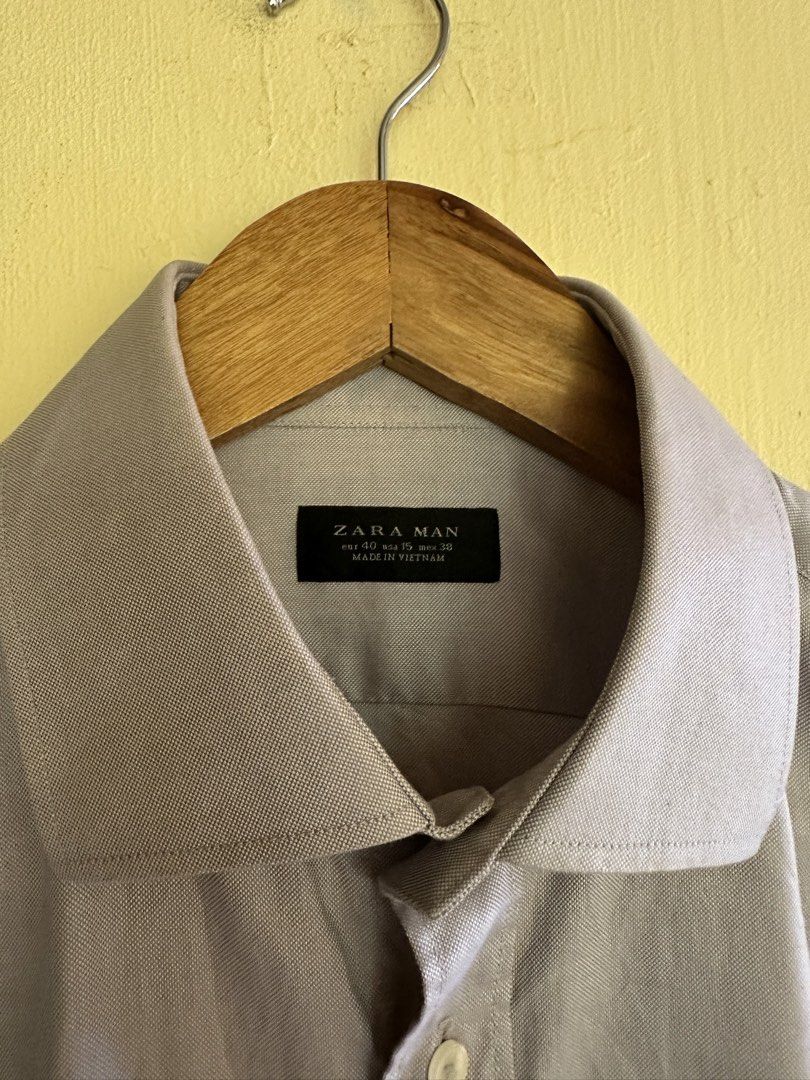Zara Man Grey Long Sleeve Button Up Shirt (Category: Tshirts & Polo Shirts ) located in Calapan. Submitted by shakalak (Listing ID 1463174810, Image 2). Description: - Zara Man Grey Long Sleeve Shirt - Button-up front with classic collar - Min signs of used sa inner collar -21x27-29 - Ideal for smart casual or work attire - Please check photos for detailed condition.