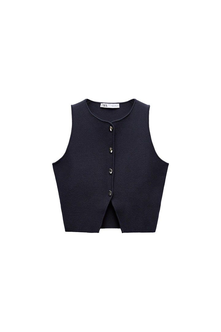Zara Navy Blue Buttoned Knit Vest - S (Category: Sleeveless) located in General Trias. Submitted by 1992thelabel (Listing ID 1463185837, Image 1). Description: Selling to feed more bellies! 🐶🐱Proceeds go to my rescue dogs, cats & strays. Your purchase would mean a lot! Thank you 🐾 -Worn once too tight for me - Navy blue knit vest from Zara - Sleeveless with round neckline - Features gold-toned buttons down the front - Cropped length with a sma