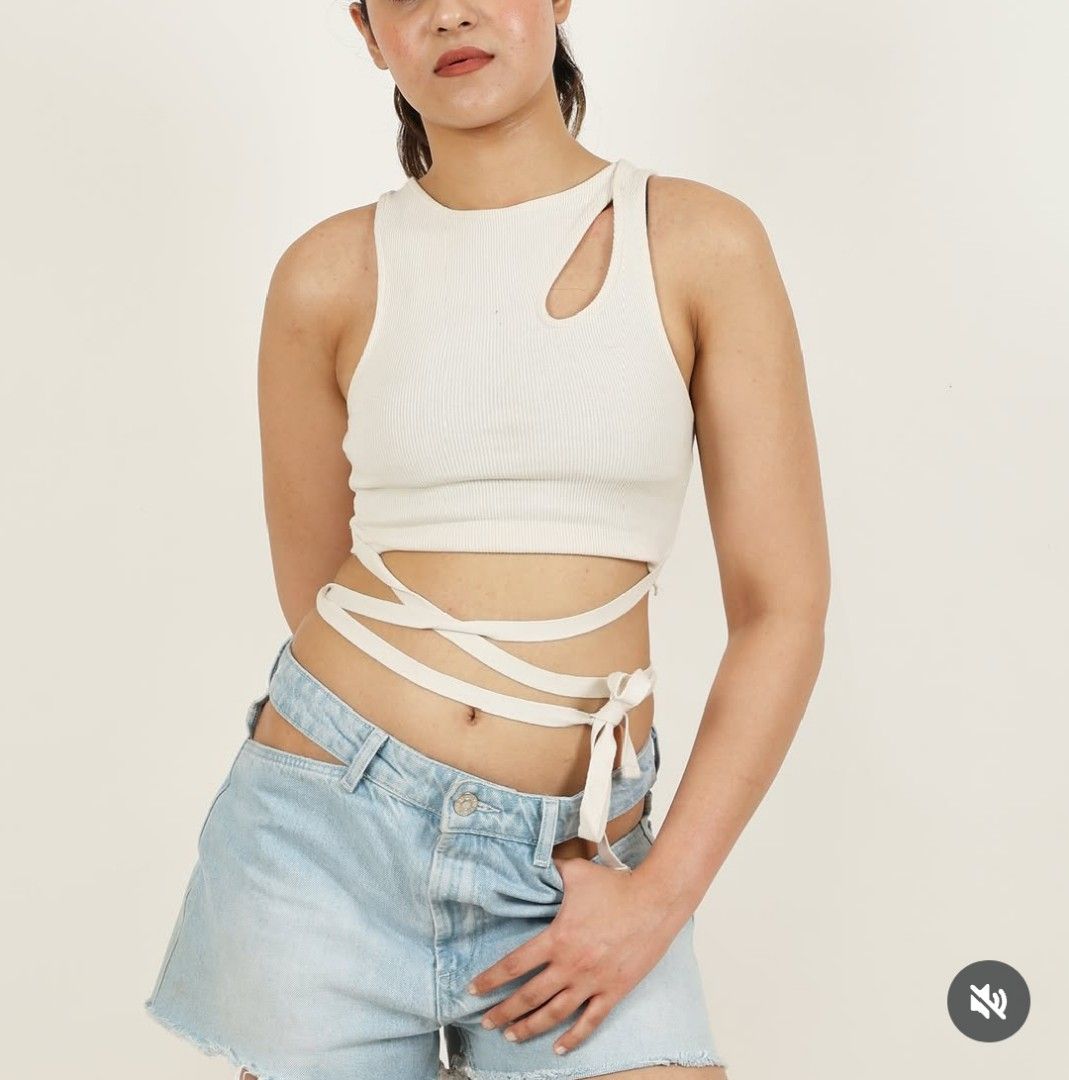 ZARA Ribbed Cut-Out Wrap Crop Top (Category: Others Tops) located in Manila. Submitted by shajanina.14 (Listing ID 1463219175, Image 1). Description: ZARA Original Preloved As good as new Large- US As per measuring tape, Bust- 30 to 42 inches Waist- 26 to 40 inches Length- 15 inches .