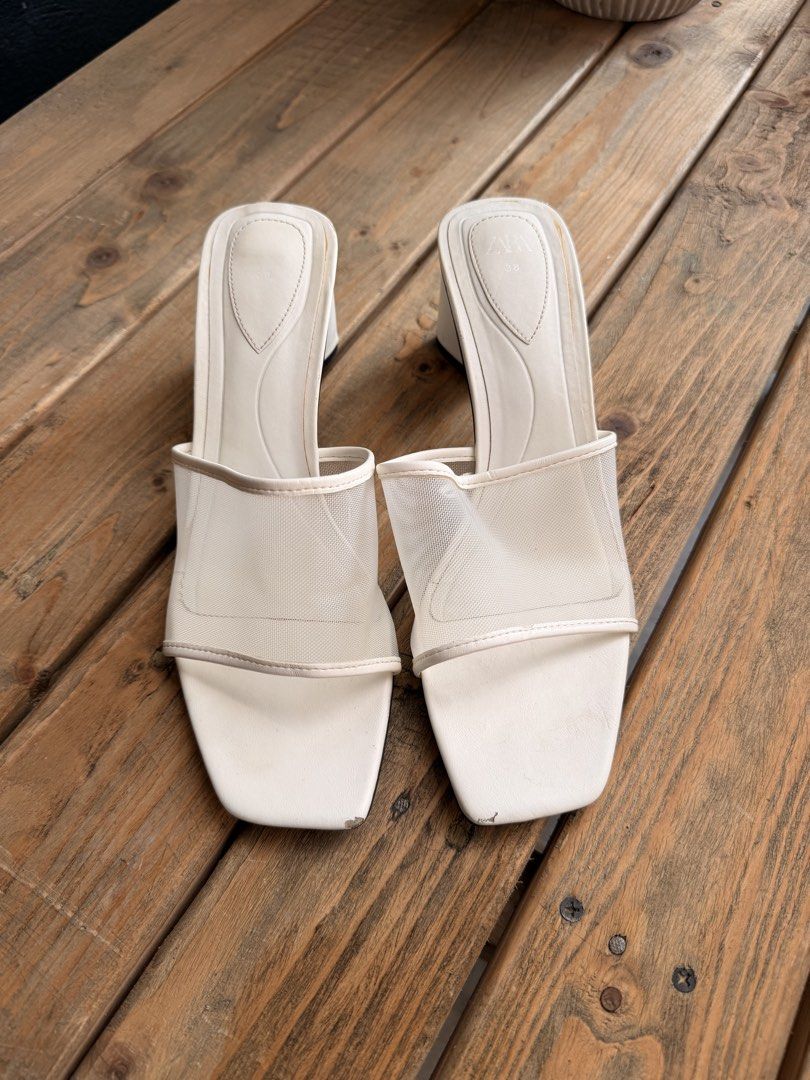 ZARA White Mesh Square Toe Block Heels (Category: Heels) located in Tuguegarao City. Submitted by joysmithznjo (Listing ID 1463201654, Image 1). Description: - ZARA White Mesh Heels - Size: 38 - Design: Square toe, block heel - Style: Easy slip-on - Condition: Good, with minor scuffs on heel edges - Versatile: Perfect for dressing up or down.