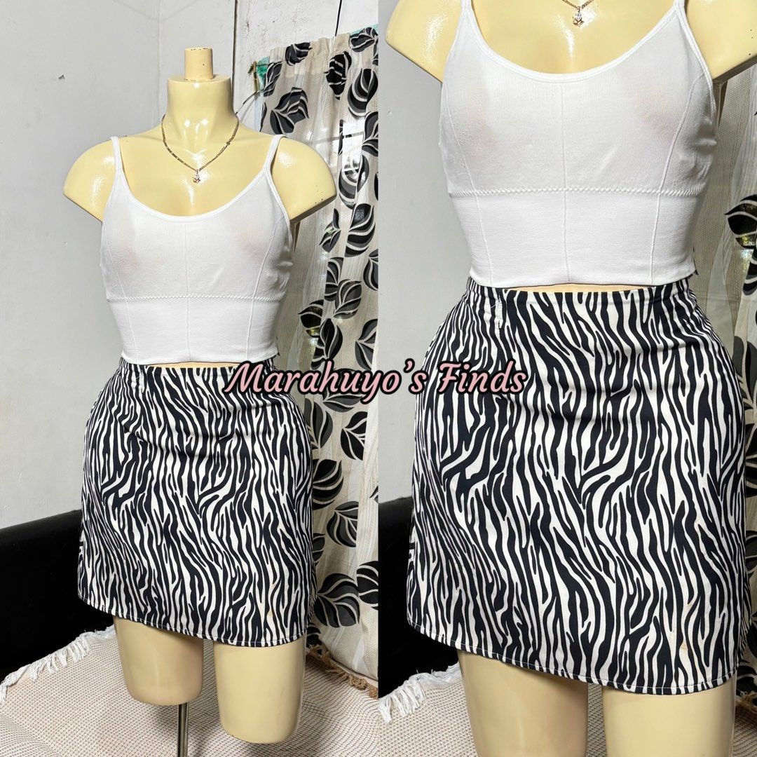 Zebra Print Mini Skirt with White Crop Top Set (Category: Sets or Coordinates) located in Mabalacat. Submitted by marahuyos.finds (Listing ID 1463232117, Image 2). Description: - Adorable zebra print mini skirt - Includes a white ribbed crop top - Skirt features an inner short for added comfort - Versatile for casual day or night looks - Pairs well with sneakers or heels.
