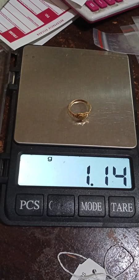 18k Light weight Gold ring (Category: Other Accessories) located in Teresa. Submitted by lovedbykels (Listing ID 1463347035, Image 2). Description: Bought from Ms. Riza Laquio (Owner of Happy Gold on Facebook) - Due to usage it's not a perfectly circled ring anymore - size 8.