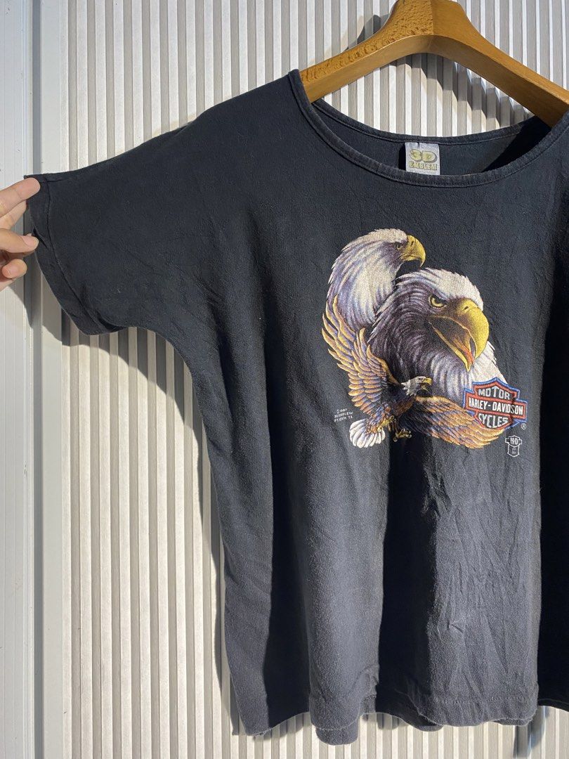 1987 Women’s Harley-Davidson Eagle Graphic / 3D Emblem (Category: Shirts) located in Bocaue. Submitted by jinvtg (Listing ID 1463511930, Image 3). Description: 1987 Women’s Harley-Davidson Eagle Graphic / 3D Emblem 20W 22.5L L DM to purchase! Send offers tags: vintage tshirt, vintage shirt, vintage tee, harley davidson, 3d emblem, 80s shirt, 80s tee.