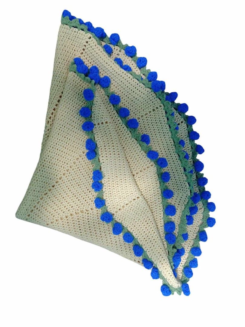30cm Crochet blanket boquet (Category: Other Accessories) located in Baguio. Submitted by vyner_hues (Listing ID 1463406636, Image 1). Description: - Beautiful handmade crocheted blanket or shawl. - Intricate crochet work with decorative pom-pom edging. - Available in cream with blue, purple, or yellow pom-poms. - Adds a cozy touch to your home or as a stylish accessory. - Each piece is unique and crafted with care. - Great for gifting!.