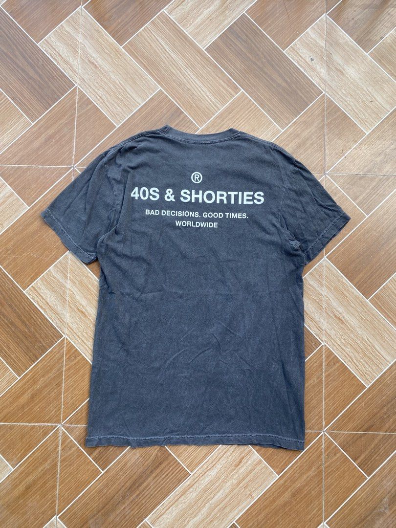 40s & Shorties T-Shirt Size M (Category: Tshirts & Polo Shirts ) located in Davao. Submitted by thirdy.pfp (Listing ID 1463417834, Image 3). Description: 40s & Shorties Charcoal Black tee Medium 20 width 28 length Excellent condition 9/10 350 - Grey 40s & Shorties T-shirt - Size: Medium (M) - Material: 100% Cotton - Design: Features 'Bad Decisions. Good Times. Worldwide.' slogan on front and back - Style: Ideal for casual wear.