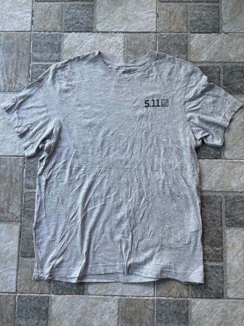 5.11 Tactical T-Shirt Grey "Always Be Ready" (Category: Tshirts & Polo Shirts ) located in Iriga City. Submitted by thrifttobicol29 (Listing ID 1463449712, Image 1). Description: - Grey 5.11 Tactical T-Shirt - Size: Small - 'Always Be Ready' slogan with graphic on the back - Small 5.11 logo on the front chest - Comfortable for everyday wear - Suitable for casual outings or training - 511 Medium W 21" L 28" Excellent condition Issue: Unnoticeable 