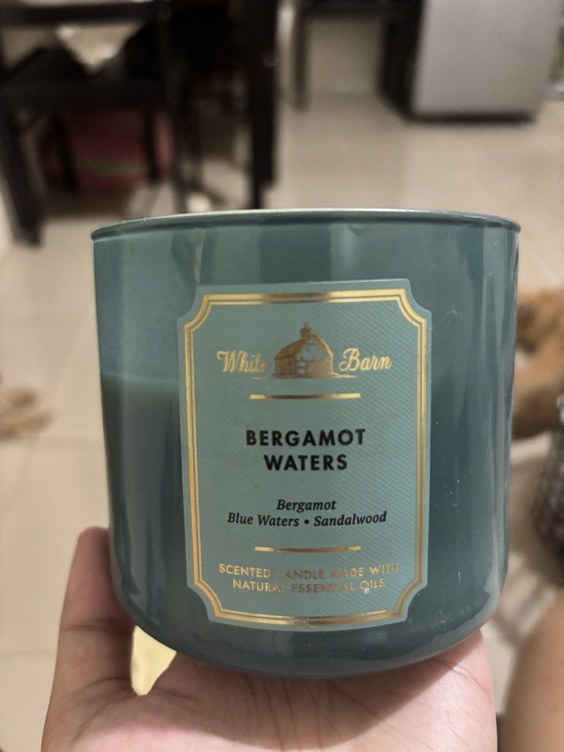 80% White Barn Bergamot Waters Scented Candle (Category: Home Fragrance) located in Manila. Submitted by thebargain_basementph (Listing ID 1463371640, Image 1). Description: White Barn 3-wick candle in Bergamot Waters. Enjoy the fresh scent of bergamot, blue waters, and sandalwood. Long-lasting, made with essential oils. Perfect for your home! Used only in candle warmer.