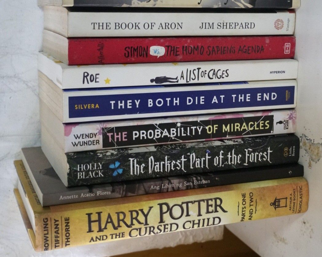 [8 BOOK BUNDLE] take all for P1800 (Category: Storybooks) located in Pasig City. Submitted by croisshark (Listing ID 1461037669, Image 1). Description: TAKE ALL 10 BOOKS FOR ONLY P1800 That's only 225 per book 🤯 The Book of Aron by Jim Shepard Simon VS The Homosapien Agenda by Becky Albertali A List of Cages by Robin Roe They Both Die At The End by Adam Silvera The Probability of Miracles by Wendy Wunder The Darkest Part of the Forest by Holly B