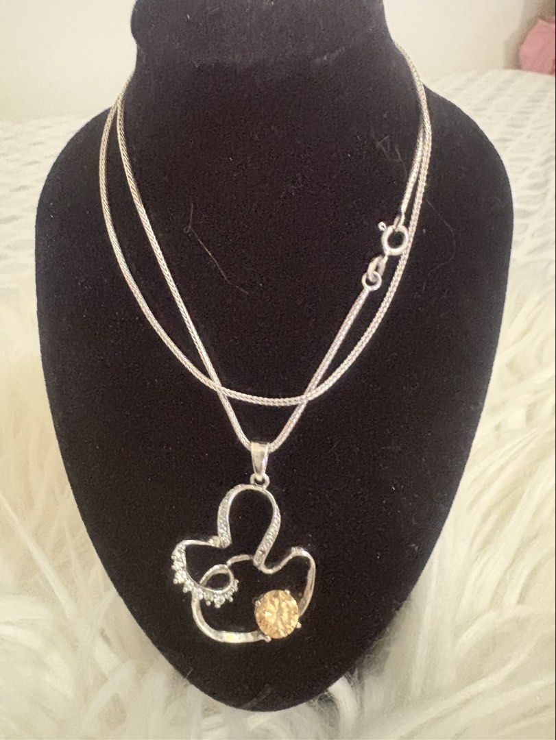 925 Sterling Silver Mickey Mouse pendant with Stones (Category: Necklaces) located in Iligan City. Submitted by sampascan229943 (Listing ID 1463486087, Image 1). Description: - Cute Mickey Mouse inspired pendant necklace - Made of genuine 925 sterling silver - Adorned with sparkling clear and champagne colored stones - Includes a sterling silver chain with a secure clasp - Ideal gift for Disney fans and jewelry enthusiasts.