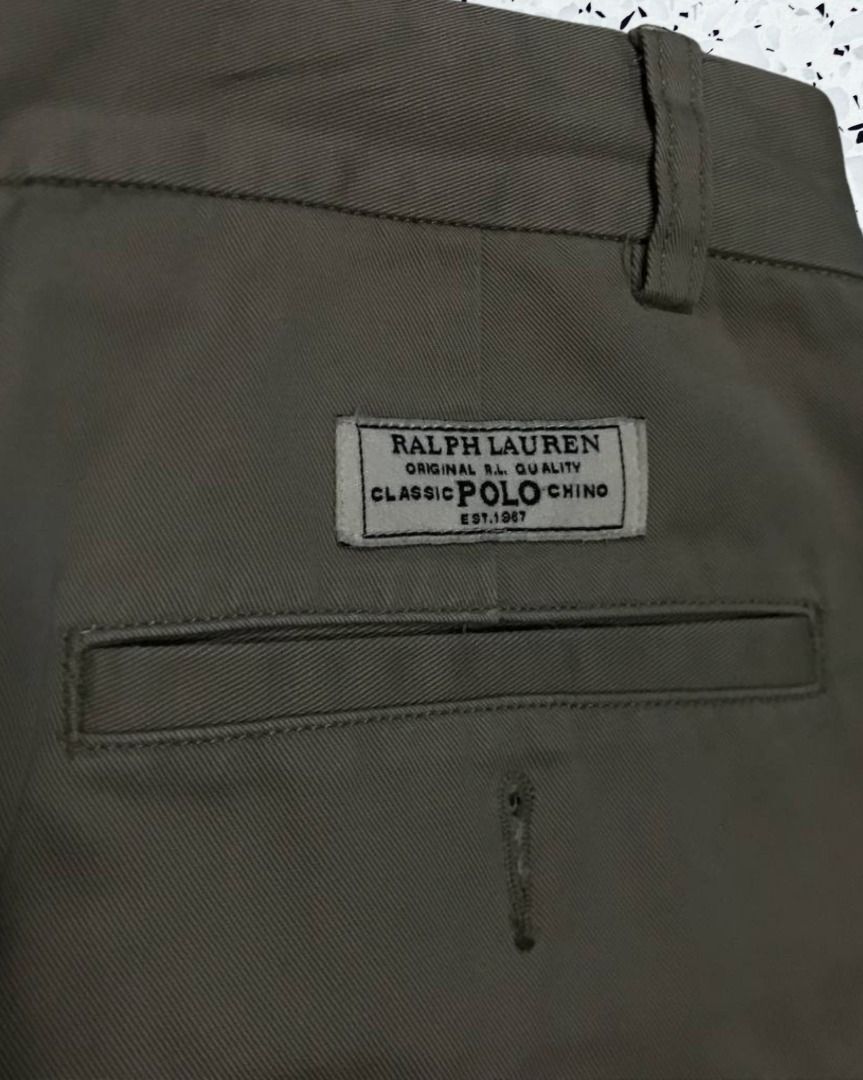 [ Ralph Lauren ] Vintage Pants (Category: Chinos) located in Quezon City. Submitted by fortecant (Listing ID 1463402418, Image 1). Description: RL Vintage Pants [ Ralph Lauren ] Vintage Pants | Vintage-inspired Ralph Lauren pants with a classic silhouette, perfect for timeless casual styling. ™️ Brand: Ralph Lauren ☁️ Material: Not specified 📐 Dimes: L42 × W32 [ Waist 32 ] 💰 Price: ₱1,500 ⚠️ Issue: White spot (Barely Noticeable Excellent Condit