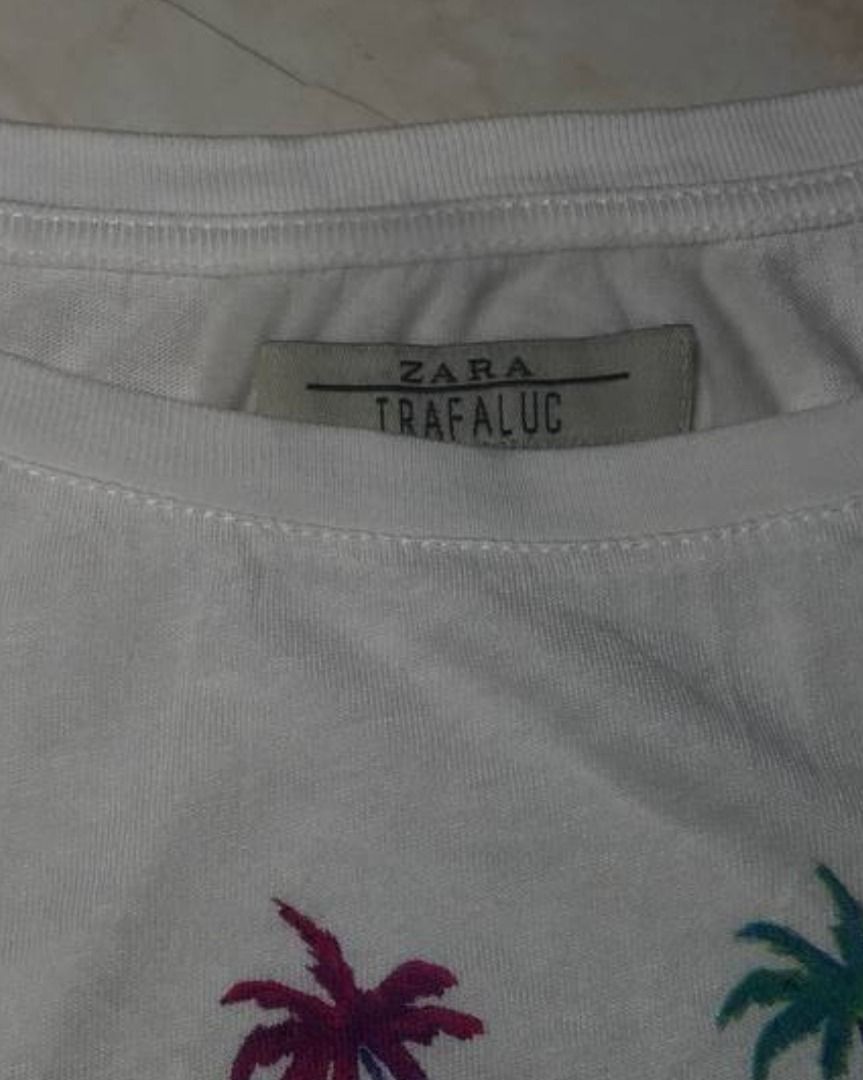 [ Zara Trafaluc ] Tropical Graphic Y2K (Category: Shirts) located in Quezon City. Submitted by fortecant (Listing ID 1463402436, Image 2). Description: Zara Trafaluc | Clean and versatile Zara Trafaluc piece with an easy everyday silhouette, perfect for casual styling. Fits for both Men and Women ™️ Brand: Zara Trafaluc ☁️ Material: Cotton 📐 Dimes: L21 × W17 [ fits XS–S ] 💰 Price: ₱450 ✨ Good Condition ✨ ˜”°• 𝓝𝓸𝓽𝓮𝓼 / 𝓓𝓲𝓼𝓬𝓵𝓪𝓲𝓶𝓮𝓻 •