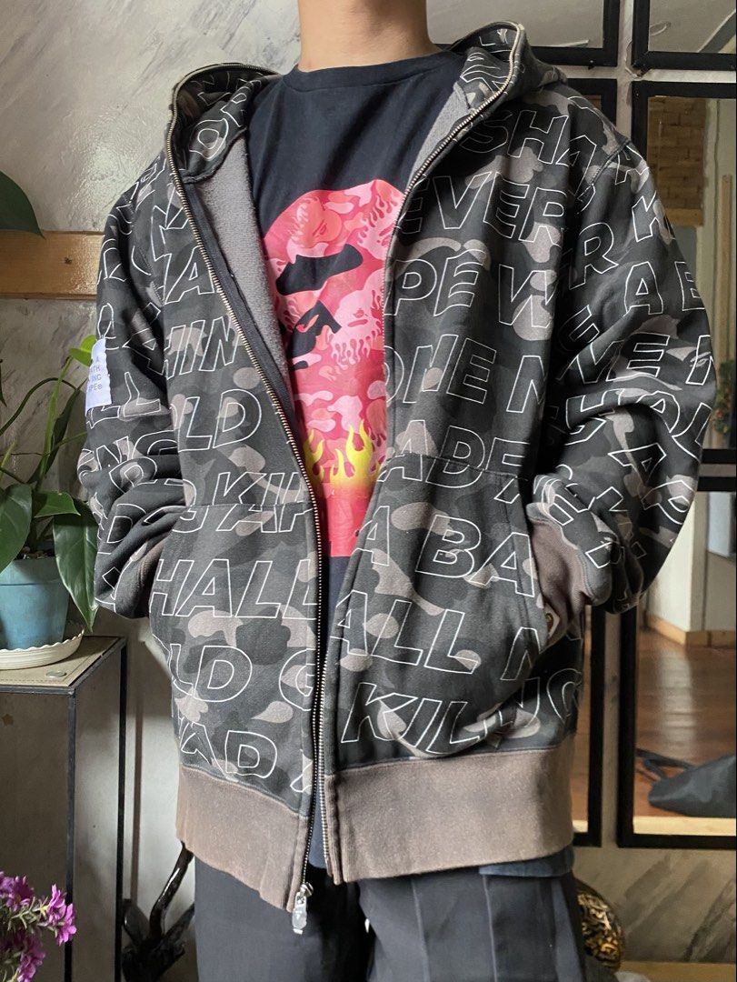 A Bathing Ape (BAPE) Text Camo Full Zip Hoodie (Category: Coats, Jackets and Outerwear) located in Baguio. Submitted by archival.store (Listing ID 1463472970, Image 1). Description: Size tagged:2XL Issue:none Width: 25.3 Length:29.5 Shoulder:21 Sleeve:27 Mine:4,500.