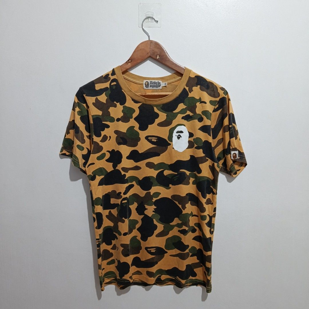 A Bathing Ape Yellow Camou with back print (Category: Activewear) located in Manila. Submitted by goodsrags (Listing ID 1463513324, Image 1). Description: What you see is what you get 25L/18W.