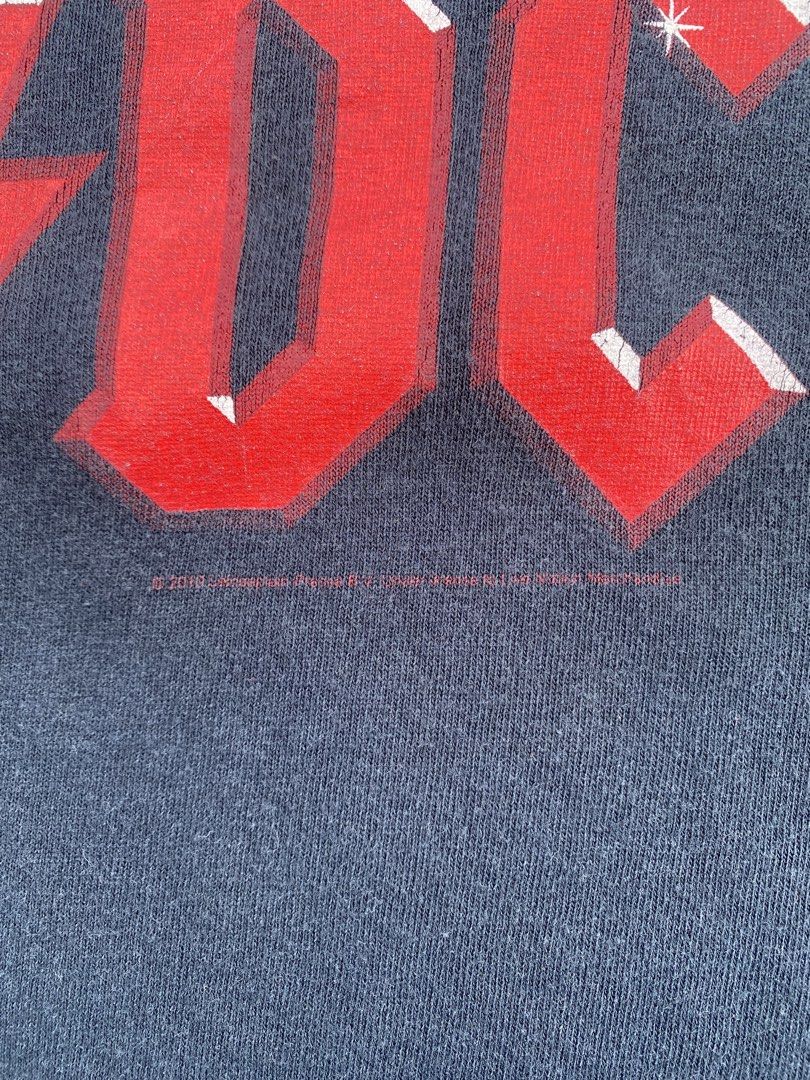 ACDC Band Shirt (Category: Tshirts & Polo Shirts ) located in Bulacan. Submitted by badass.thrift.finds (Listing ID 1463353275, Image 3). Description: ACDC Band Shirt Copyright licensed 2010 Gildan Tag Size XL On tag 24 width 29 length.