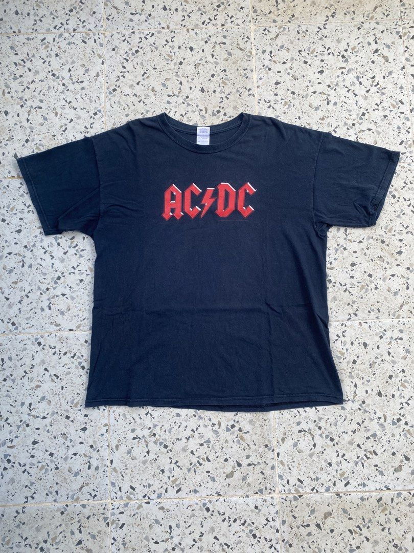 ACDC Band Shirt (Category: Tshirts & Polo Shirts ) located in Bulacan. Submitted by badass.thrift.finds (Listing ID 1463353275, Image 1). Description: ACDC Band Shirt Copyright licensed 2010 Gildan Tag Size XL On tag 24 width 29 length.