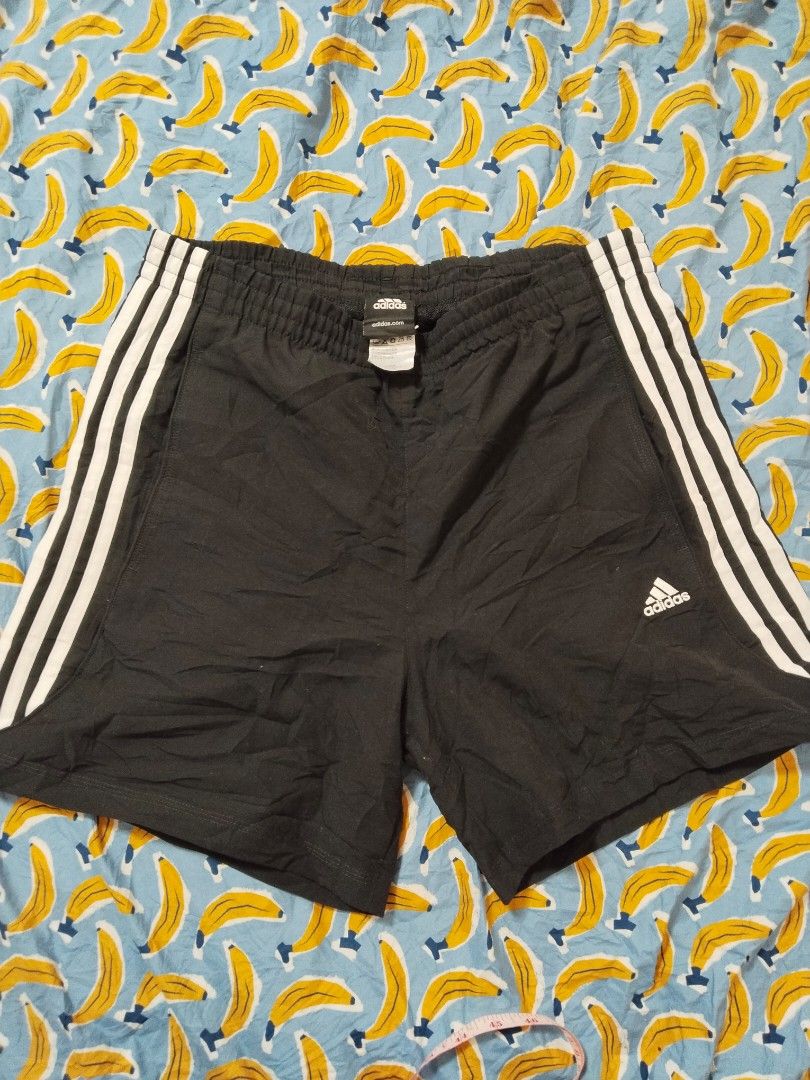 Adidas 3 stripes Athletic Short (Category: Shorts) located in Mabalacat. Submitted by al_amin_thrift (Listing ID 1463461028, Image 1). Description: Adidas 3-Stripes Athletic Shorts — Size M Length 17 ✅ Brand: Adidas — Authentic ✅ Line: Performance Essentials ✅ Style: Classic 3 white stripes on black ✅ Color: Black with White accents ✅ Size: M (175/80A) — fits approx waist 30–33" ✅ Material: 100% Polyester — quick-dry, lightweight, breathable mesh