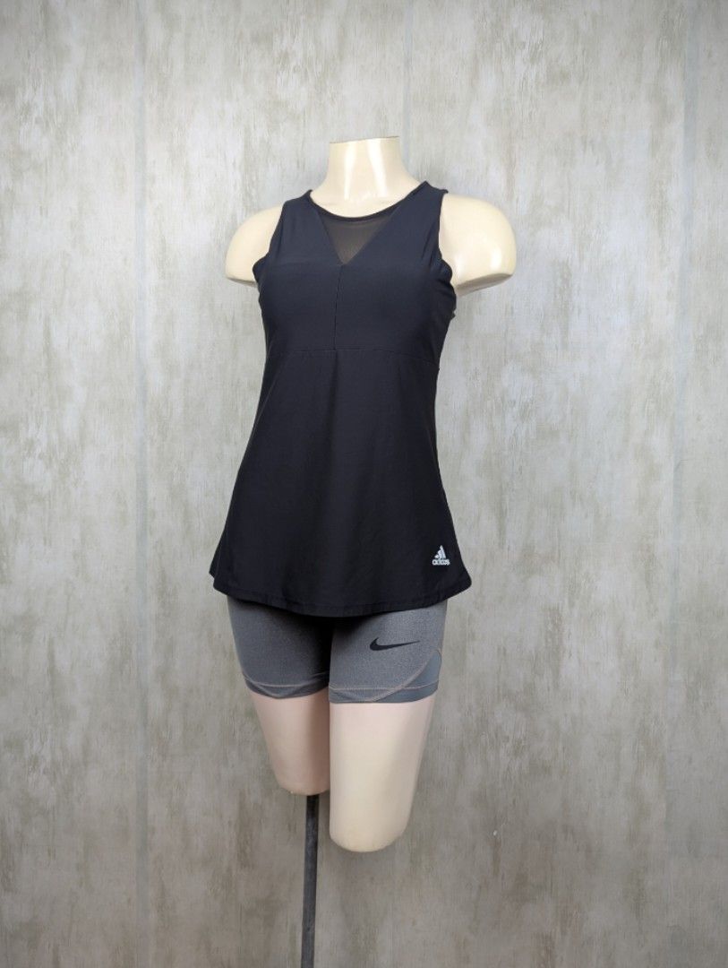 Adidas athletic tank top (Category: Activewear) located in General Santos City (Dadiangas). Submitted by kakrots.06 (Listing ID 1463482013, Image 1). Description: Adidas athletic tank top featuring a sheer mesh V-neck panel and a signature white logo near the hem. Excellent condition Padded UnderBust Garter:22"-34 or 11"-17" L:25" (XS-S) 180 + SF Ship via J&T Express MOP: Gcash/Maya/Maribank/Gotyme 📍 Location: General Santos City.