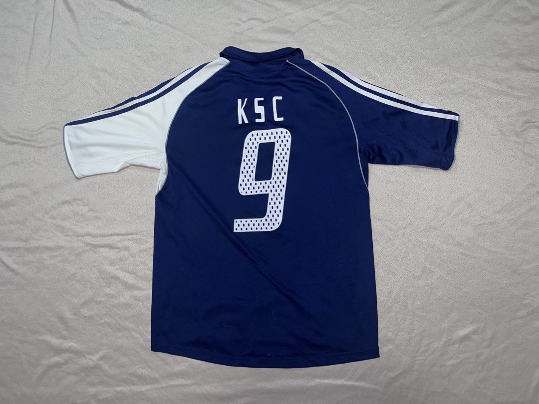 Adidas Blue and White Gradient Jersey (Category: Tshirts & Polo Shirts ) located in Quezon City. Submitted by gvsfinds_ (Listing ID 1463482370, Image 2). Description: Dark blue Adidas soccer jersey with white and light blue gradient. White Adidas logo on front. KSC and number 9 on the back Size: XL Dimensions: - Length: 27.5 - Width: 21 .