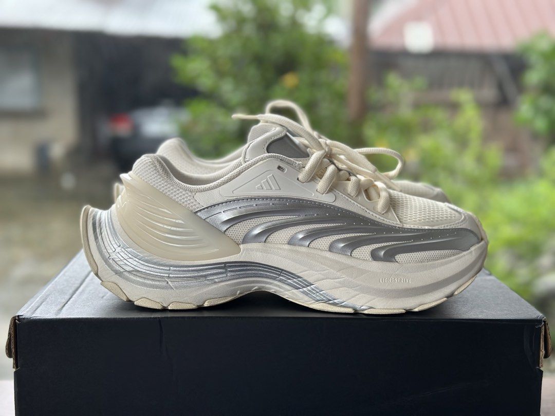 Adidas Lightstrike Shoes Cream Silver (Category: Sneakers) located in Manila. Submitted by emerson11m22362 (Listing ID 1463386202, Image 1). Description: ADIDAS XLG MTW 📌SIZE - 9.5US/ 9UK/ 27.5CM 📌 COLOR - OFF WHITE 📌 with box Unisex bulky shoes Used - liked new Issue? Dirt only sa outsole and sign of usage Retail price is 7,300 pesos Selling for 3,500 shipped Negotiable for sure buyer DM your offers..