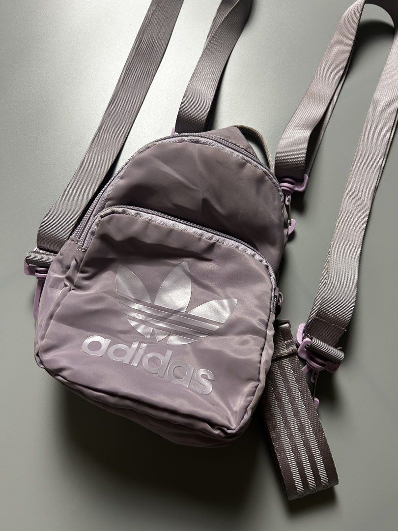 Adidas Mini Backpack Purple Trefoil Logo (Category: Backpacks) located in Tacloban City. Submitted by azthrifting24 (Listing ID 1463392673, Image 2). Description: - Cute mini Adidas backpack - Light purple color - Shiny trefoil logo - Front zip pocket - Adjustable straps - Perfect for carrying essentials .