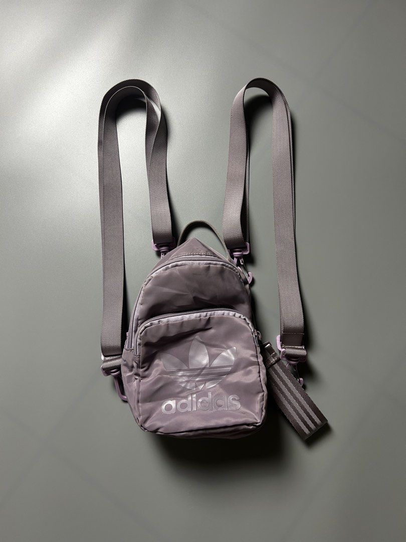 Adidas Mini Backpack Purple Trefoil Logo (Category: Backpacks) located in Tacloban City. Submitted by azthrifting24 (Listing ID 1463392673, Image 1). Description: - Cute mini Adidas backpack - Light purple color - Shiny trefoil logo - Front zip pocket - Adjustable straps - Perfect for carrying essentials .