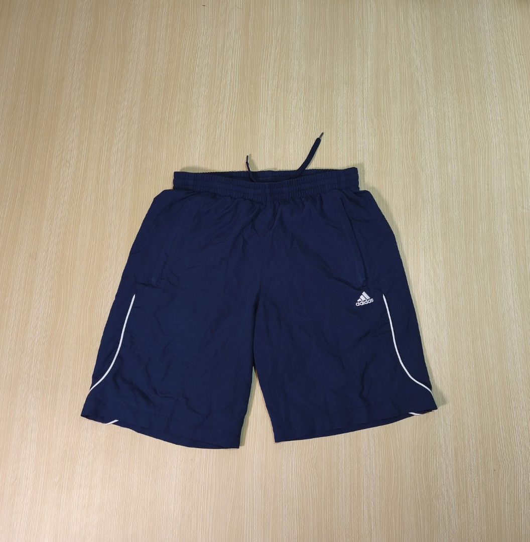 Adidas Navy Blue Athletic Shorts (Category: Shorts) located in Santo Tomas. Submitted by ThriftyTeng07 (Listing ID 1463339990, Image 1). Description: Adidas Short Waistline 32-34 Length-18" Excellent condition Pang Running or any Outdoor Activities 450+SF ONLY #Adidas.