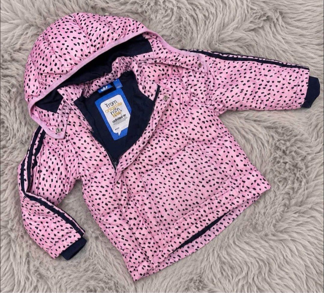 Adidas Pink Black Dot Puffer Jacket with Hood (Category: Coats, Jackets and Outerwear) located in Manila. Submitted by goldencrystal.1726fa (Listing ID 1463457380, Image 2). Description: - Adorable pink Adidas puffer jacket for 2-3 years old girl - Features a cute black dot pattern - Cozy navy blue lining and hood interior - Classic Adidas stripes on the sleeves - Unique 'From Originals With Love' tag - Ideal for keeping warm during cooler weathe