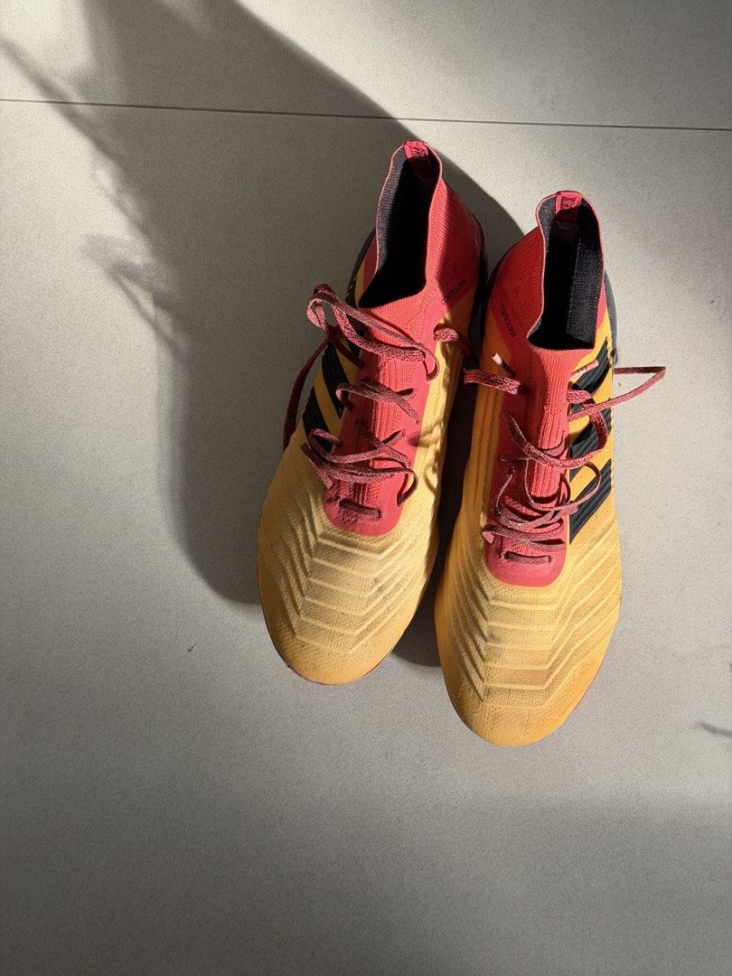 Adidas Predator Soccer Cleats Yellow Red (Category: Sneakers) located in Taguig. Submitted by anxmz (Listing ID 1463407520, Image 2). Description: - Adidas Predator soccer cleats - Striking yellow and red colorway - Secure lace-up closure - Comfortable sock-like collar for a snug fit - Ideal for playing on the field - Ready for your next game!.