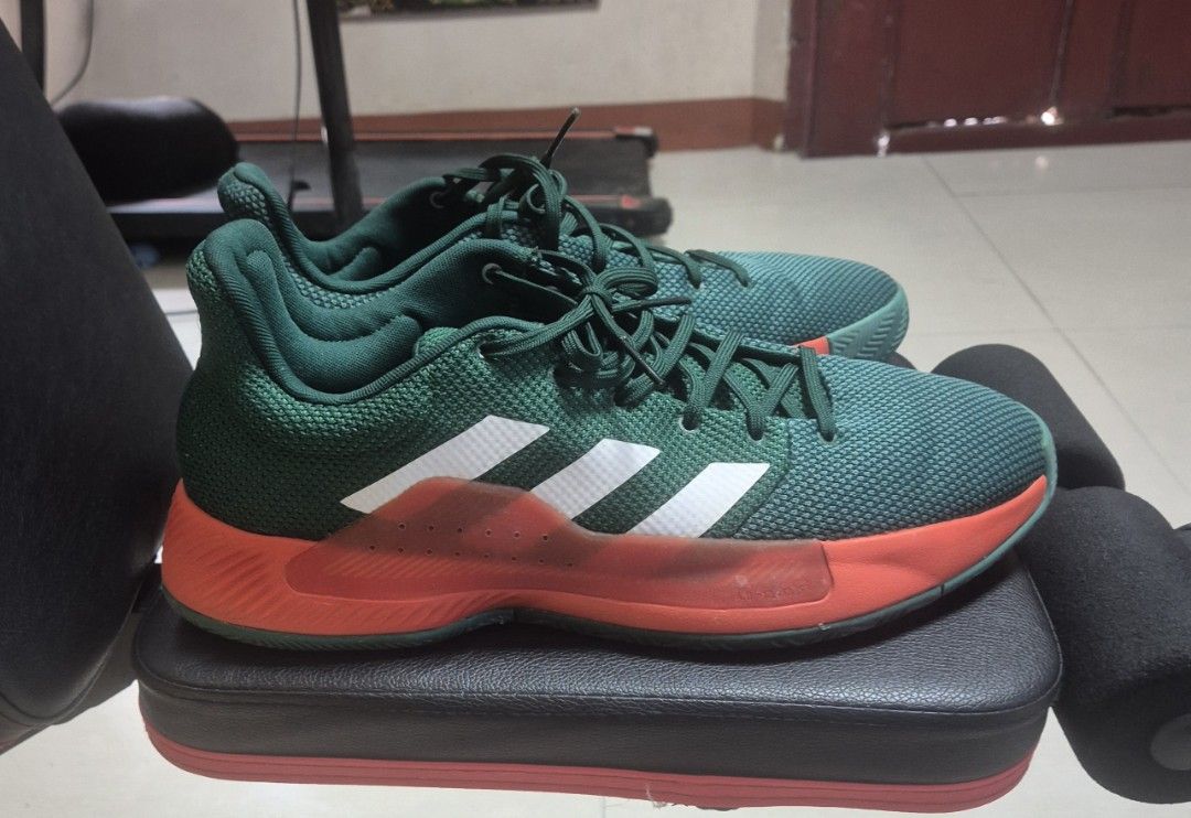 Adidas Pro Bounce Madness Low (Category: Sneakers) located in Manila. Submitted by ferdzdelr35380 (Listing ID 1463376806, Image 1). Description: - Basketball sneakers - Unique color scheme: Green, orange accents and white adidas brand stripes - Textured design - Comfortable fit - Green soles - Green laces.