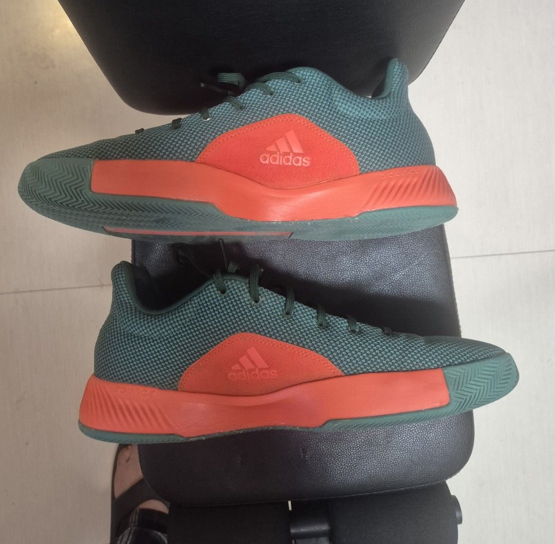 Adidas Pro Bounce Madness Low (Category: Sneakers) located in Manila. Submitted by ferdzdelr35380 (Listing ID 1463376806, Image 2). Description: - Basketball sneakers - Unique color scheme: Green, orange accents and white adidas brand stripes - Textured design - Comfortable fit - Green soles - Green laces.
