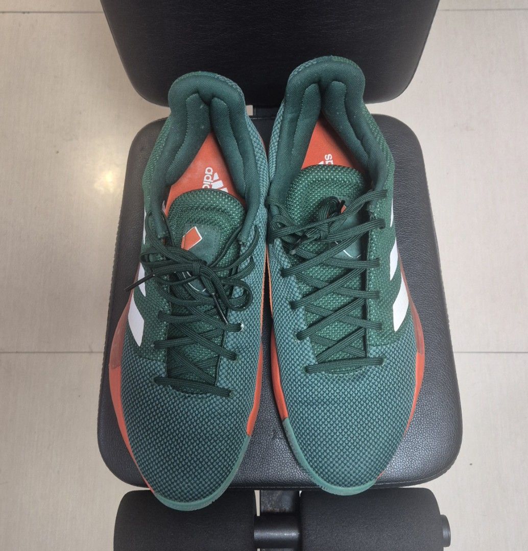 Adidas Pro Bounce Madness Low (Category: Sneakers) located in Manila. Submitted by ferdzdelr35380 (Listing ID 1463376806, Image 3). Description: - Basketball sneakers - Unique color scheme: Green, orange accents and white adidas brand stripes - Textured design - Comfortable fit - Green soles - Green laces.