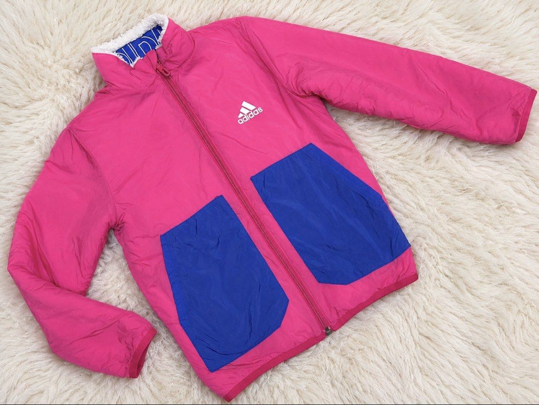 Adidas Reversible Fleece Jacket Pink Blue (Category: Coats, Jackets and Outerwear) located in Manila. Submitted by goldencrystal.1726fa (Listing ID 1463456357, Image 2). Description: - Super cute Adidas jacket for 8-9 years old - Reversible design: Pink with blue pockets on one side, cream fleece with pink/blue accents on the other - Adidas logo featured on both sides - Ideal for staying warm and stylish -may mga fibers lang dumikit sa sherpa par