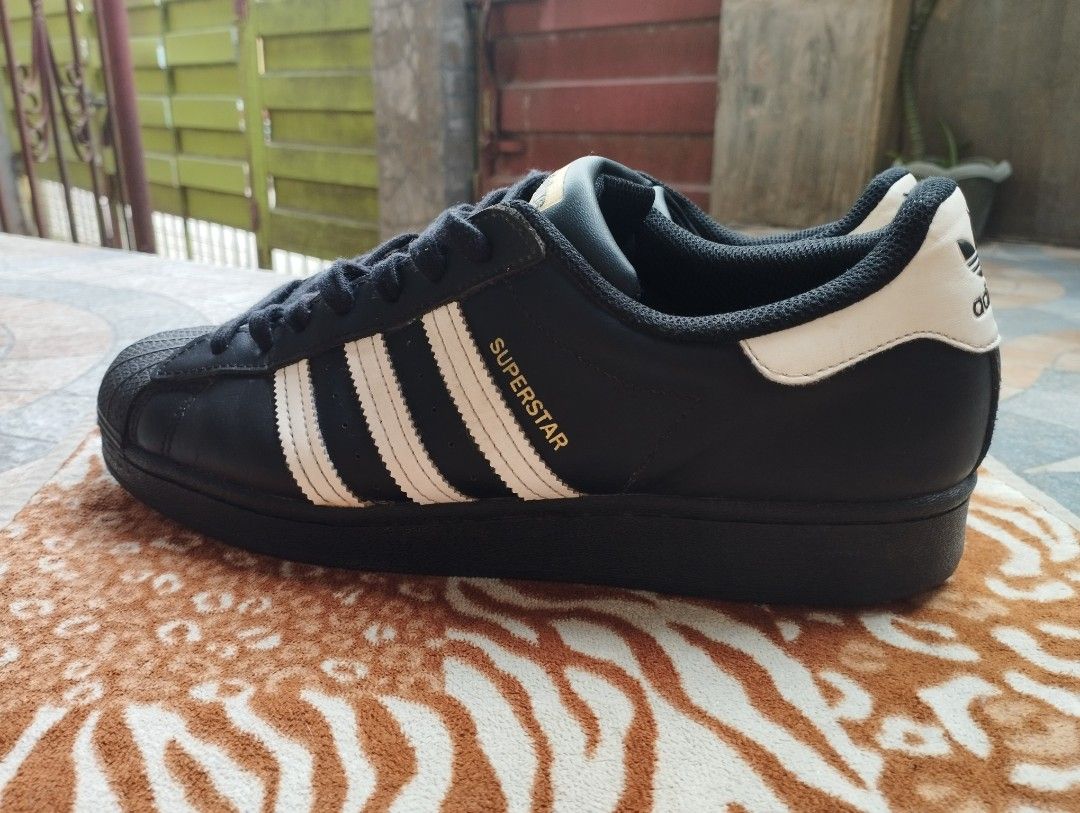 Adidas Superstar (Category: Sneakers) located in Zamboanga. Submitted by vintagetreasures.zc (Listing ID 1463406943, Image 1). Description: Adidas Superstar Black Size: 10US / 44EURO Good as New 4x Used Only Sign of Usage Issue: Minor Scratch right pair 1800 + SF.