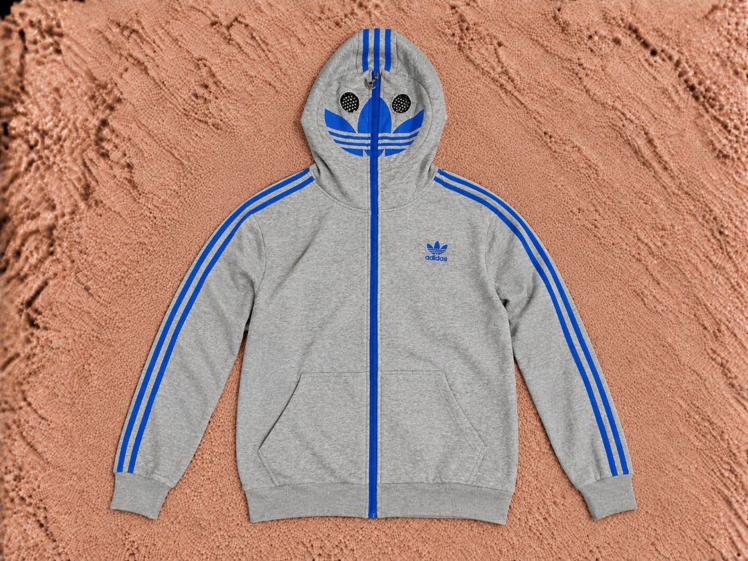 Adidas Track Jacket (Category: Coats, Jackets and Outerwear) located in Quezon City. Submitted by drift_and_vibe_thrift (Listing ID 1463511273, Image 2). Description: - Classic Adidas track jacket - Iconic three stripes on sleeves - Zip-up front with stand-up collar - Two side pockets - Ideal for casual wear or sports.