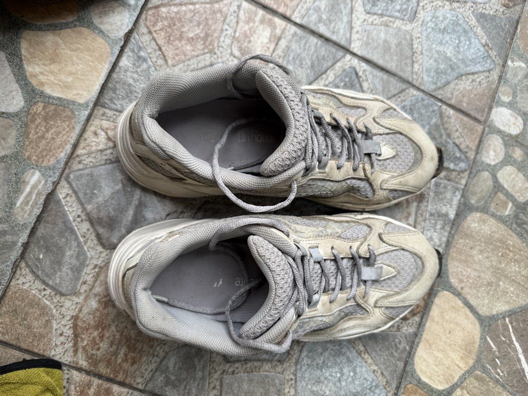 Adidas Yeezy Boost 700 MNVN Sneakers (Category: Sneakers) located in Caloocan City. Submitted by mochibolala13 (Listing ID 1463380548, Image 2). Description: - Adidas Yeezy Boost 700 MNVN - Colorway: Light Grey / Off-White - Size: US 10.5 / UK 10 / EU 44.5 - Condition: Used, with signs of wear - Note: NEED CLEANING - Plenty of life left in these classic kicks! Get dirty at the storage.