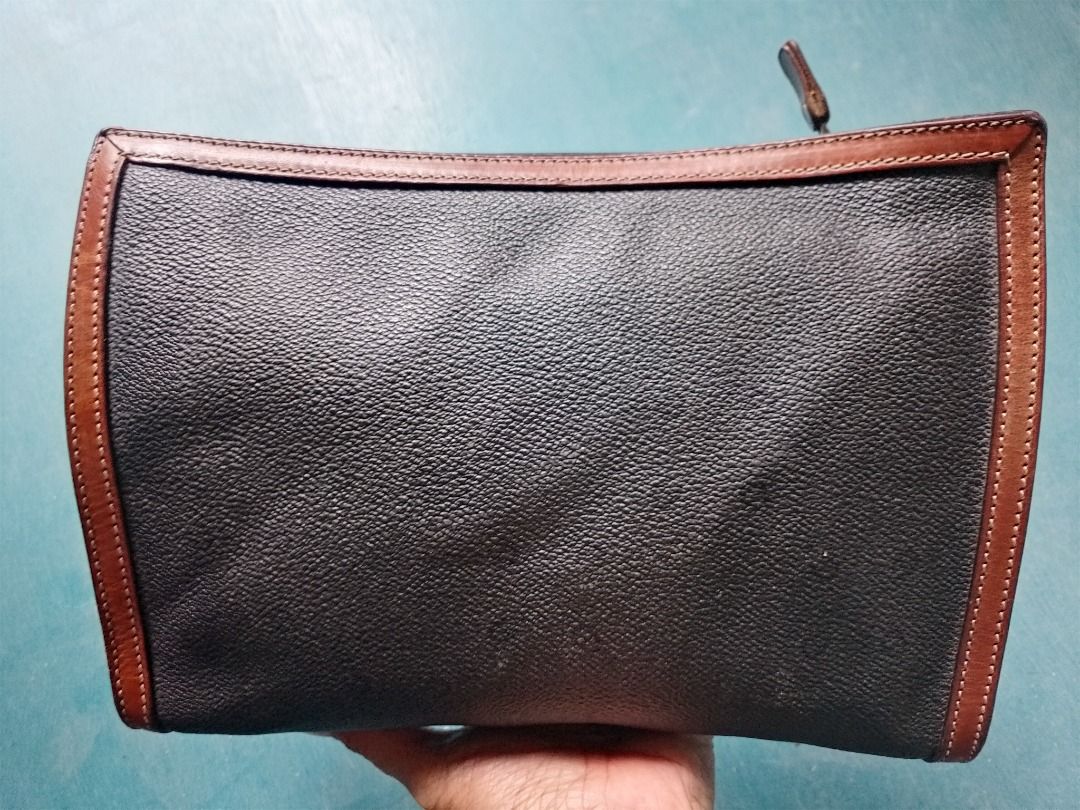 Aigner Black Monogram Leather Pouch Clutch (Category: Luxury Bags & Wallets) located in Caloocan City. Submitted by hmm_shop83 (Listing ID 1463390713, Image 2). Description: - Vintage Aigner pouch - Black monogram leather with brown trim - Zipper closure - Perfect for organizing essentials or as a small clutch.
