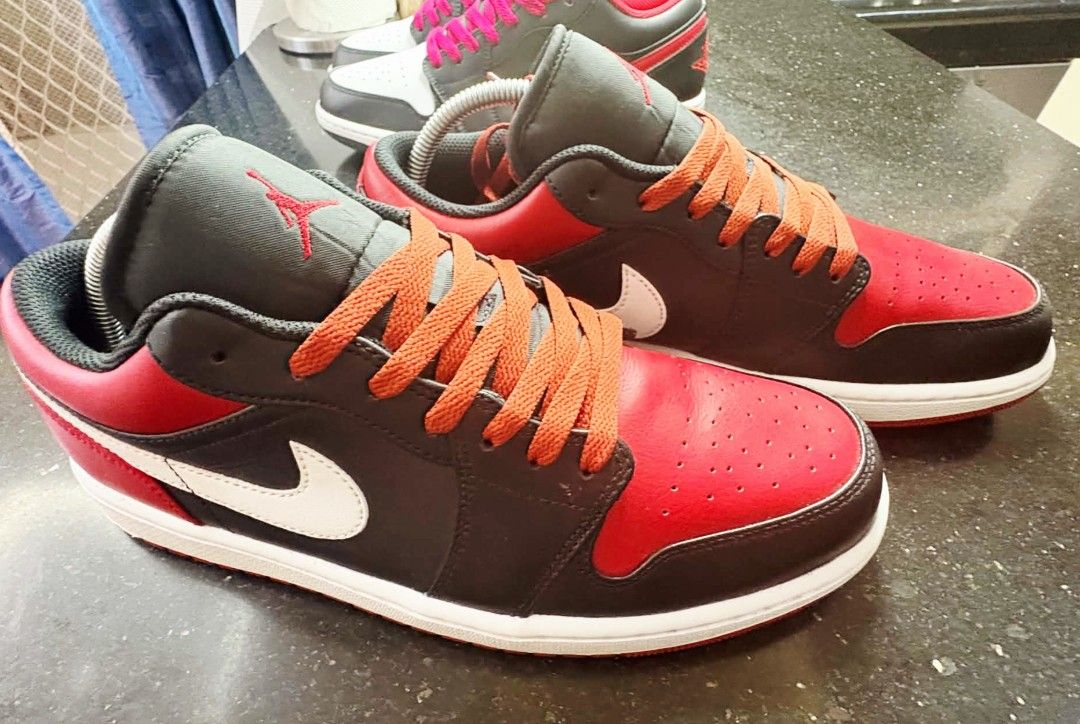 Air Jordan 1 low Alternate Bred toe & White Toe (Category: Sneakers) located in Cavite. Submitted by quickmoon_381624 (Listing ID 1463344472, Image 3). Description: Air Jordan 1 low Alternate Bred Toe & Air Jordan 1 Low White Toe ➡️ Selling as Pair ➡️ RFS: Decluttering ➡️both pairs are in excellent condition ➡️No Sole Sep, Heel Drag Inclusions ✔️Autehntic Air Jordan 1 low Shoes ✔️Box ✔️Inserts ✔️Crease protector installed ✔️ extra black and red l