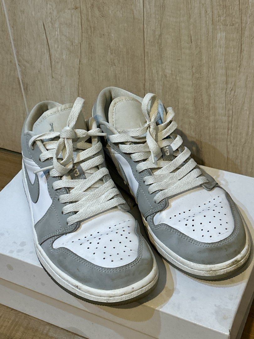 Air Jordan 1 Low Grey White (Category: Sneakers) located in Cebu City. Submitted by wednesday_wear (Listing ID 1463488373, Image 1). Description: - Authentic Air Jordan 1 Low sneakers - Stylish Grey and White colorway - Classic low-top silhouette - Ideal for casual wear and everyday outfits - Just needs cleaning.