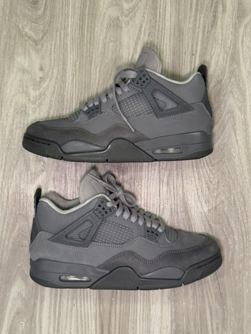 Air Jordan 4 Grey Sneakers (Category: Sneakers) located in Manila. Submitted by silent_dosss (Listing ID 1463379703, Image 1). Description: - Authentic Air Jordan 4 sneakers - Classic all-grey colorway - Iconic Jordan 4 silhouette - Features the Jumpman logo on the heel - Grey laces complete the look - A must-have for any sneaker enthusiast's collection - Feel free to ask any questions!.