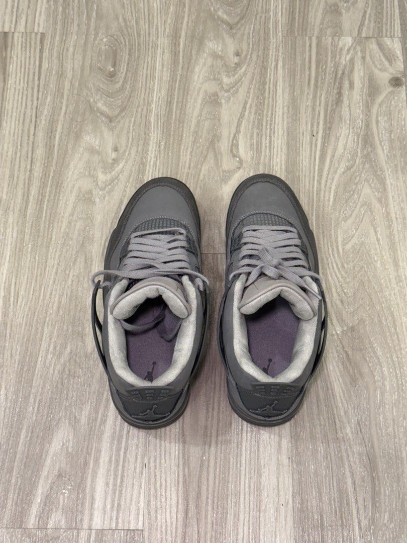Air Jordan 4 Grey Sneakers (Category: Sneakers) located in Manila. Submitted by silent_dosss (Listing ID 1463379703, Image 3). Description: - Authentic Air Jordan 4 sneakers - Classic all-grey colorway - Iconic Jordan 4 silhouette - Features the Jumpman logo on the heel - Grey laces complete the look - A must-have for any sneaker enthusiast's collection - Feel free to ask any questions!.