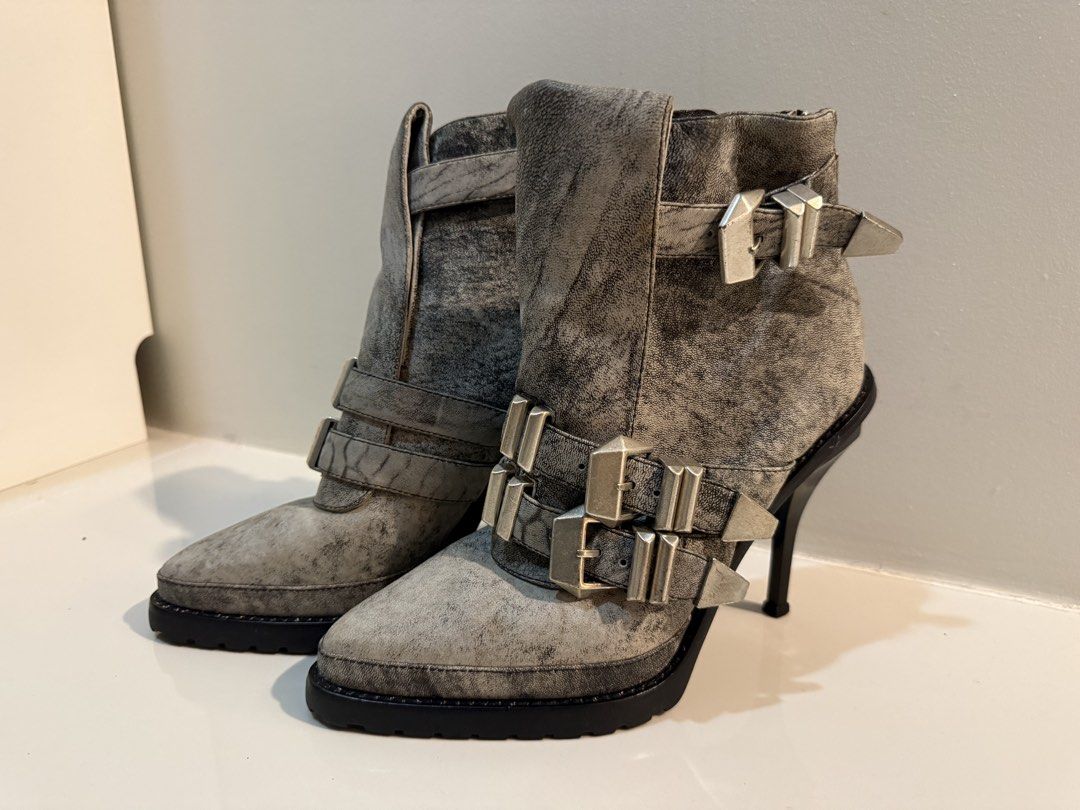 Alexander Wang Grey Buckled Heeled Boots Size 39 (Category: Boots) located in Manila. Submitted by bellarhianna777 (Listing ID 1463333249, Image 1). Description: - Grey Alexander Wang heeled boots - Size 39 - Multiple silver buckles and back zippers - Chunky platform sole with stiletto heel - Unique distressed leather look - Perfect statement piece for any outfit.