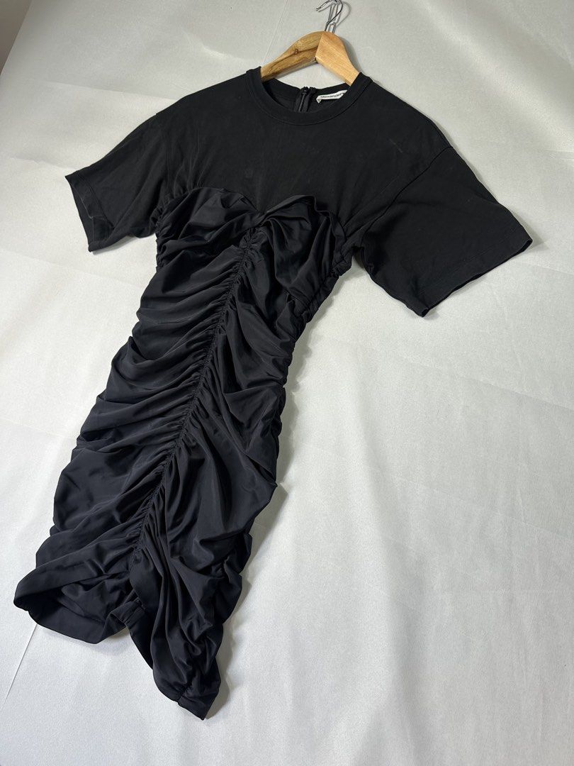 Alexanderwang Black Slim Ruflled Dress (Category: Dresses) located in Cabanglasan. Submitted by thefashiongarage.co (Listing ID 1463399887, Image 1). Description: Title - Alexanderwang Model/Name - Size on Tag - Small Conditiion - Excellent Condition with 1 Punhole Dimension (WxLxH) - 35 inches Length Category- Mini Dress Fitting - Slim Fit Made in - china Material - Cotton/Polyamide/ Elastine Color - Black Design - Year - Inclusion - None Note -