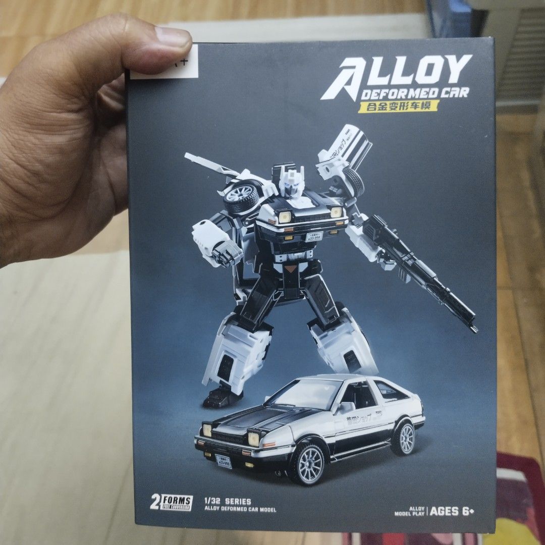 Alloy Initial D AE86 Trueno Transformers (Category: Vehicle & Diecast Models) located in Manila. Submitted by hezekiahtoys (Listing ID 1463532094, Image 2). Description: Alloy Initial D AE86 Trueno Transformers in good condition with Base and acrylic Lights up Fujiwara Tofu shop pick up Taytay Exodus payment thru Gcash..
