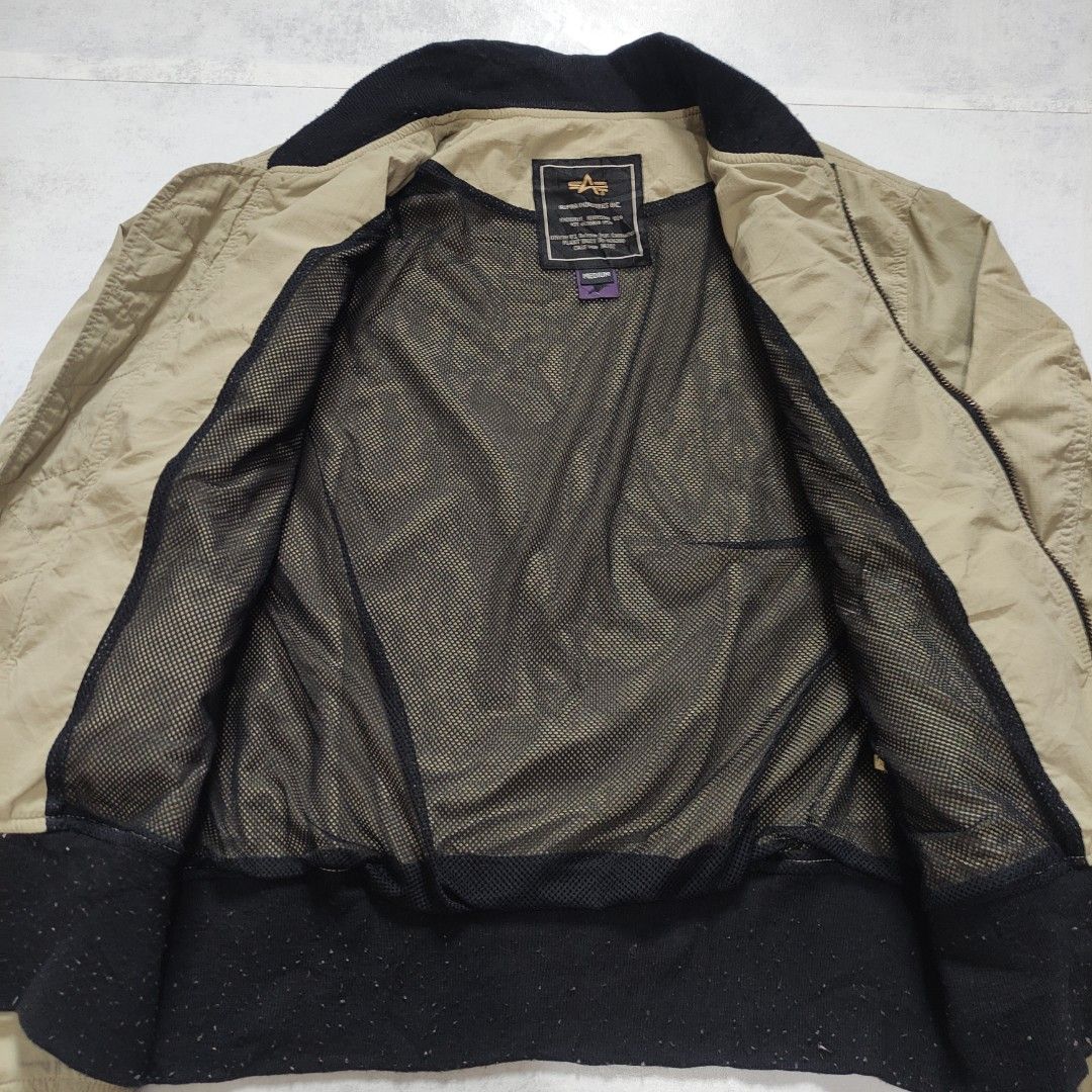 Alpha Industries Bomber Jacket (Category: Coats, Jackets and Outerwear) located in Bulacan. Submitted by thriftlockerph (Listing ID 1463370575, Image 3). Description: Size: M Dimension: 23L 21.5W Condition: 8/10 Issue: stains, scratch, lints.