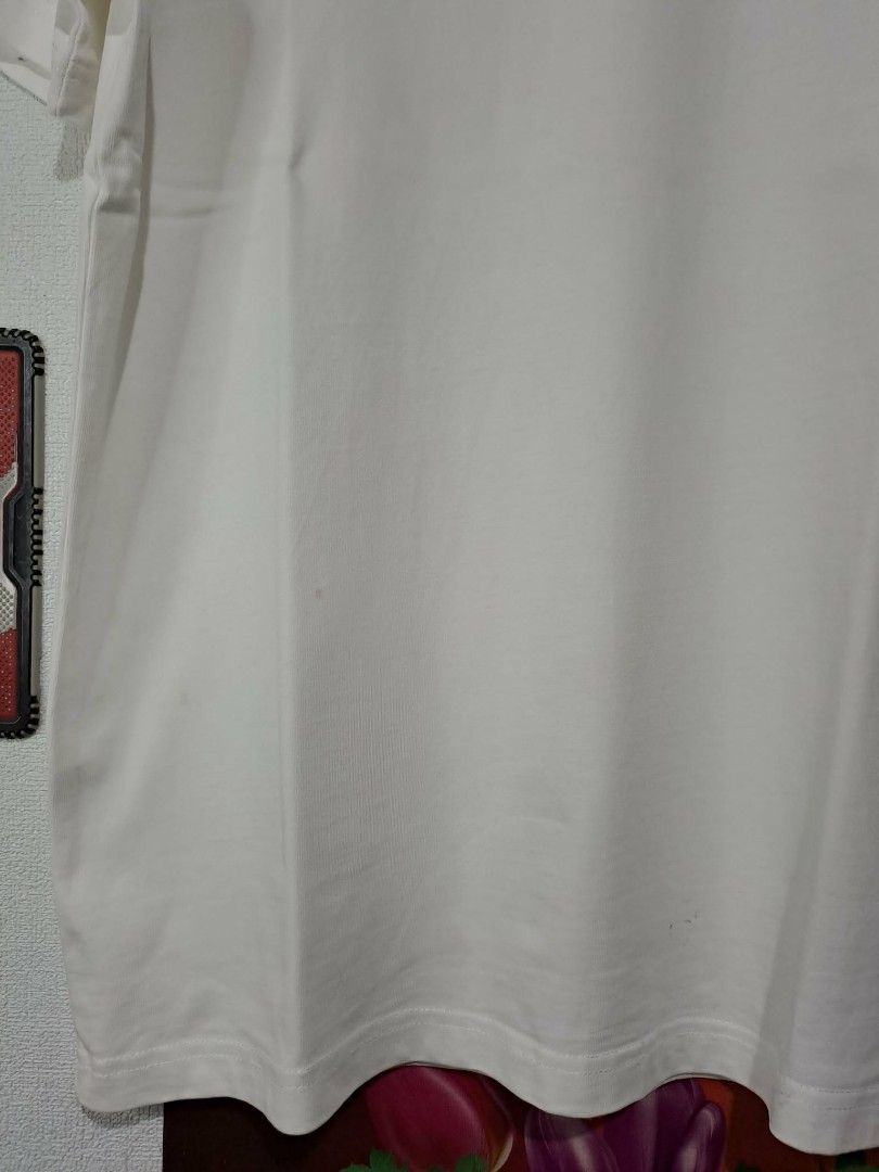 AMI (Category: Luxury Apparel) located in Manila. Submitted by yaseen_73 (Listing ID 1463388595, Image 3). Description: AMI White Embroidery Heart Logo Wearing Size : Small - Medium Dimensions : Please Refer to the Photo Color Rate : 9.5/10 Issue : Pinhole x Washable Stain Condition : 4.5/5 Free Shipping Via J&T Around Metro Manila MOP : G C A S H B A N K T R A N S F E R Seller's Location : 📍Brgy. Pansol, Q.C.