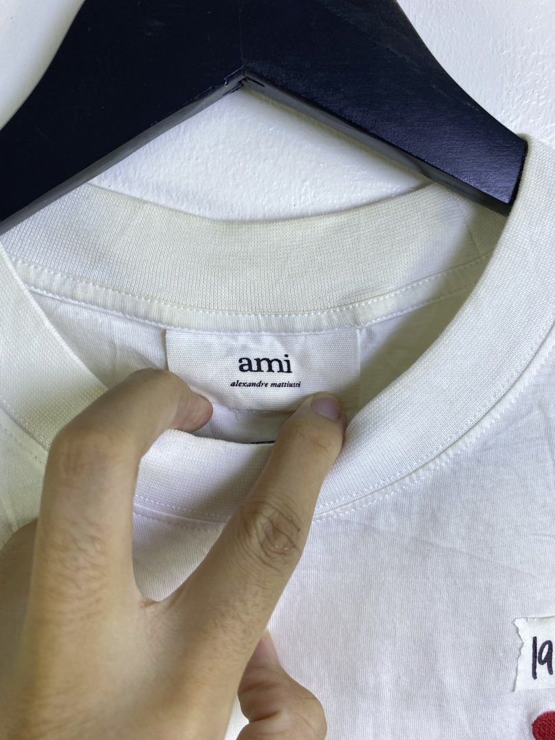 Ami Paris Tee (Category: Tshirts & Polo Shirts ) located in Manila. Submitted by declutterpromax (Listing ID 1463402679, Image 2). Description: Yellowing all around the item.