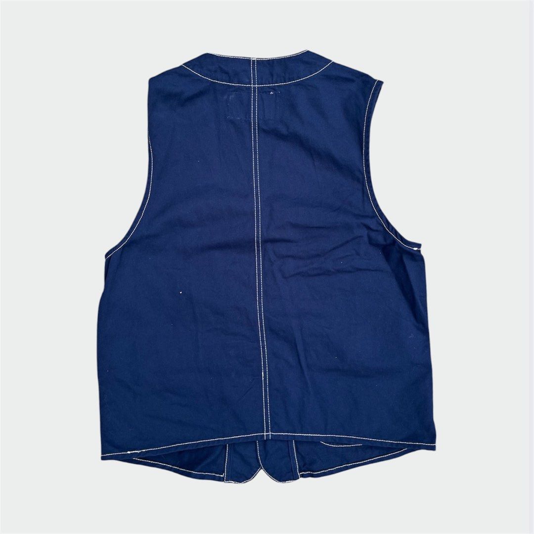 Annie Hall Vest (Category: Vests) located in Calamba. Submitted by juan_jawnz (Listing ID 1463395989, Image 2). Description: Annie Hall Vest PHP 780 Length- 24.25 Inches Width - 18 Inches Navy cotton with white contrast stitching. V-neck 4-button front, 4-pocket configuration (2 chest, 2 lower flap with buttons). Back vent detail. Heavy cotton, boxy fit. Amekaji Orgueil workwear .