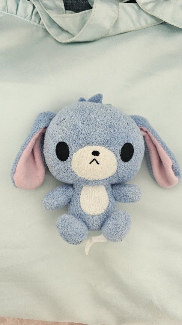 Aousa Sugarbunny Plush taito 2007 (Category: Plushies & Soft Toys) located in Butuan. Submitted by taruzakuyo95274 (Listing ID 1463347363, Image 1). Description: - PLEASE LOOK AT THE FLAWS BEFORE PURCHASING - Adorable blue bunny plush toy - Super soft and cuddly material - Features cute pink inner ears - Contrasting white belly - Black eyes and a small embroidered mouth - Ideal gift for kids or as a charming decoration - Approximately 6 inches in