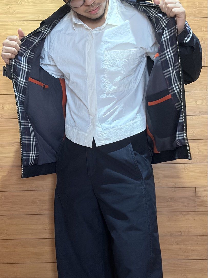 Aoyeche Vintage Navy Harrington Jacket with Plaid Lining (Category: Coats, Jackets and Outerwear) located in Las Pinas. Submitted by cmrqz (Listing ID 1463358625, Image 3). Description: - Classic navy Harrington jacket - No Zipper - Fabric is still clean and thick, nice fit - Subtle plaid lining inside - Two front pockets - One inner pocket .