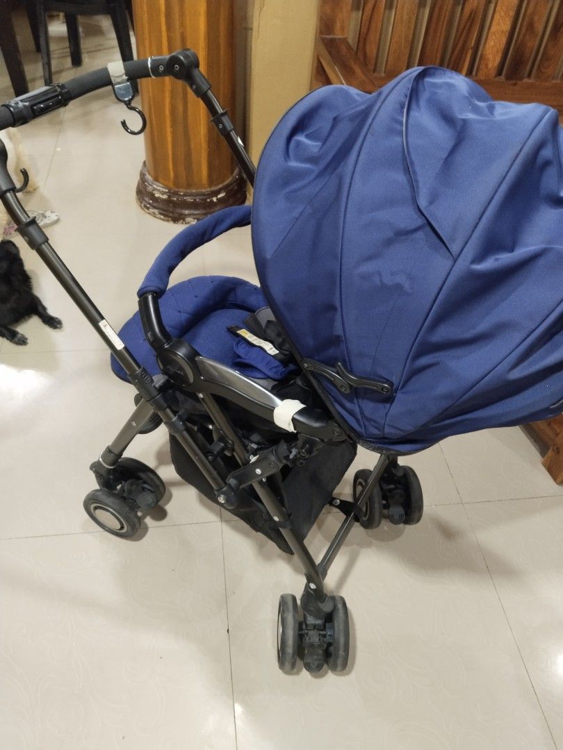 Aprica soraria Stroller - Navy Blue (Category: Strollers) located in Cavite. Submitted by dimple082 (Listing ID 1463553654, Image 2). Description: - Combi stroller in stylish navy blue - Lightweight and super easy to maneuver - Excellent canopy for sun protection - Convenient storage basket underneath - Folds compactly for easy transport - Ideal for everyday outings with your baby.